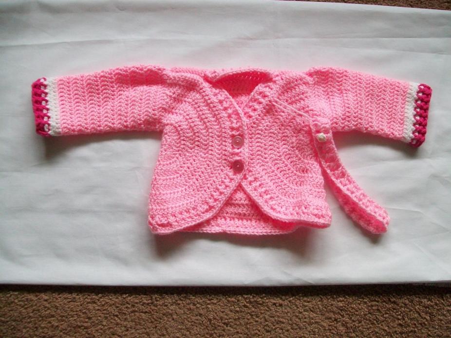 girl's cardigan done and a picture of both the boy's and the girl's cardigan-003-jpg